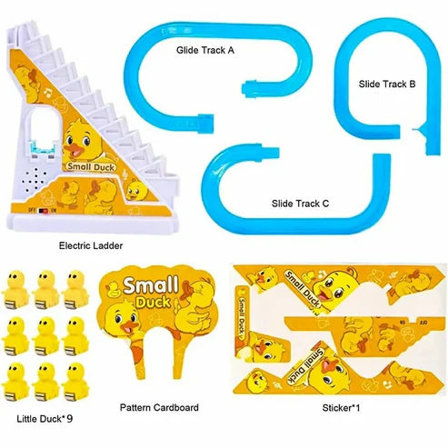 Toddler musical slide toy showing a close-up of three mini toy penguins racing down a winding blue roller coaster track and climbing an electric escalator.