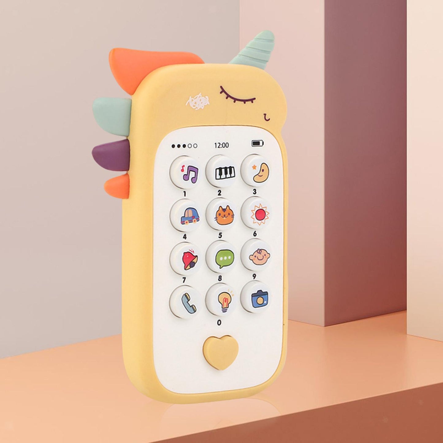 Detailed view of the 12 numeric keys on a baby music player phone featuring cute animal and vehicle icons.