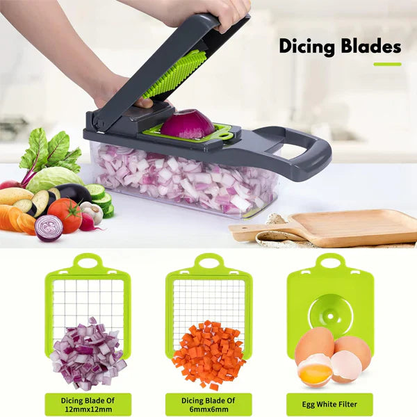 A comprehensive look at a high-end kitchen chopping gadget, positioned on a wooden cutting board with fresh produce. The set includes a multi-blade precision system tower, a main one-press onion chopper with a container full of diced onions, a mandoline-style grater, an egg separator, and a safety hand guard. This all-in-one tool is designed for efficient, professional-level meal preparation.