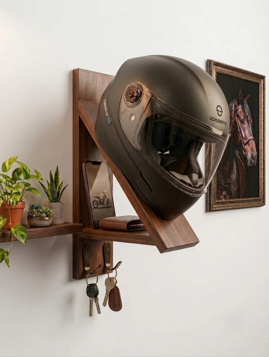A close-up shot of a unique, angled wooden form designed as a helmet stand, made of brown walnut wood. It is holding a grey-silver metallic full-face motorcycle helmet, positioned at a natural ready-to-use angle