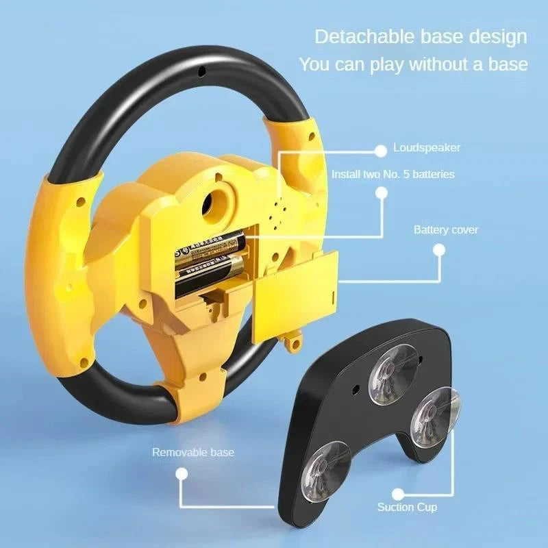 Detailed back view schematic of the yellow learning driving wheel toy explaining the removable suction cup base frame, speaker grille location, and 2x AA battery compartment.